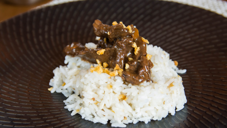 beef tapa on top of rice